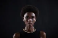 Close Up Portrait Of African American Woman With Afro Hairstyle On Black Studio Stock Photos