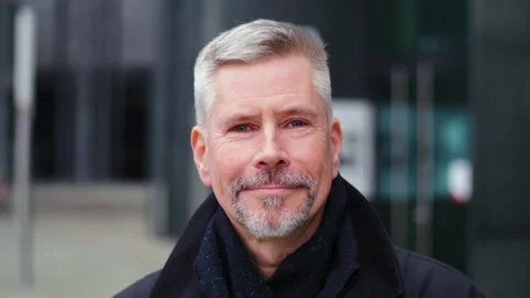 Close-up portrait of attractive, smiling and happy middle aged man in the city. Stock Footage 165208545