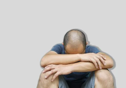 Close up portrait of Bald Asian man sitting stressful, Disappointed stressed  Stock Photos