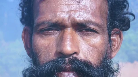 Close-up portrait of a bearded Indian man Stock Footage 103849893