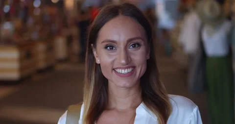 Close-up portrait beautiful dark-haired brown-eyed multi ethnic woman in white Stock Footage 221496271