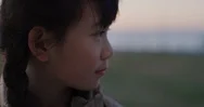 Close Up Portrait Beautiful Little Asian Girl Looking Pensive Calm Little Kid Stock Footage