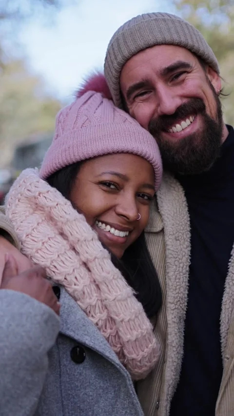 Close-up portrait of beautiful multiracial happy couple outdoor, young woman and Stock Footage 258075920