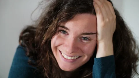 Close up portrait of beautiful smiling young woman looking at the camera. Stock Footage 150730394