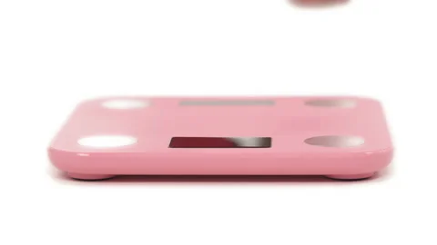 Close-up portrait of black plus size woman's legs, demonstrating weigh-out Stock-Footage 134577131