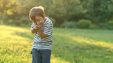 Close-up portrait of a boy with a painted face Stock Photos