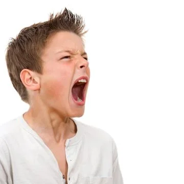 Close up portrait of boy shouting Stock Photos