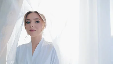 Close-up portrait of the bride looking into the camera. A young blonde woman Video stock 257663550