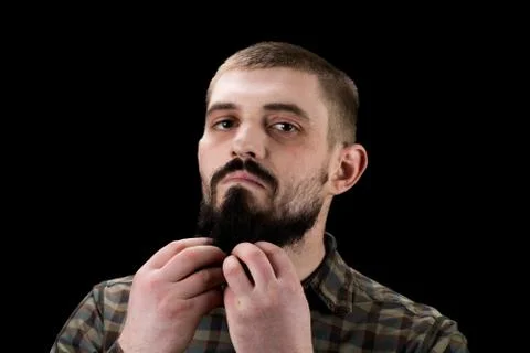 Close-up portrait of a brutal bearded man Stock Photos