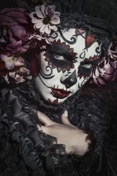 A close-up portrait of Calavera Catrina. Sugar skull makeup. Dia de los muert Stock Photos
