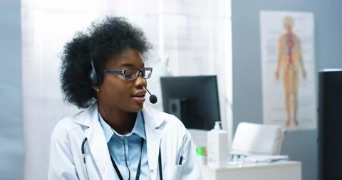 Close up portrait of cheerful pretty young African American healthcare Video stock 152846830