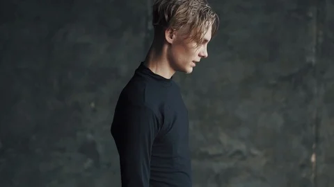 Close-up portrait of a dancer resting man after a workout Stock Footage 94138677