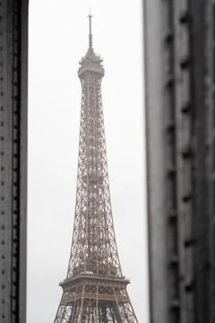 Close-up portrait of the Eiffel Tower between the columns of the Bir Hakeim Stock Photos