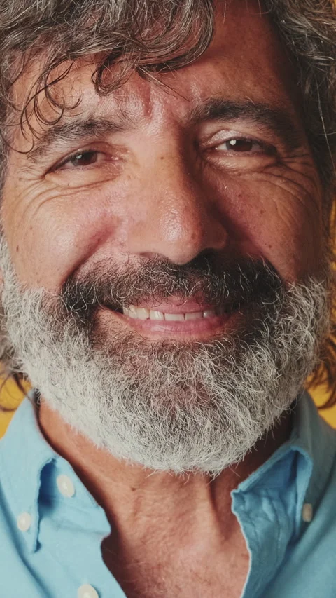 Close up portrait, elderly gray-haired man, looking camera smiling, isolated on Stock Footage 248878355