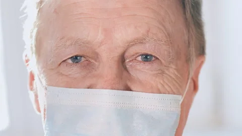 Close up portrait elderly man wearing medical mask. Stock Footage 272472025