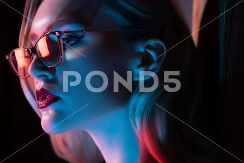 A close up portrait of an elegant lady wearing glasses. Beauty, make-up, styl Stock Photos