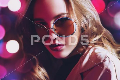 A close up portrait of an elegant lady wearing sunglasses. Beauty, make-up, s Stock Photos
