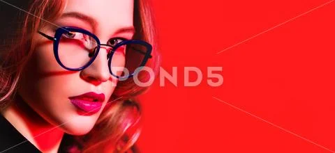 A close up portrait of an elegant lady wearing sunglasses. Beauty, make-up, s Stock Photos