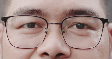 Close up portrait of face Charming Asian man with glasses and mustache smiling Stock Footage 159426097