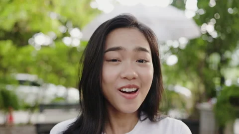 Close up portrait of face Charming Asian teenager woman with long hair Stock Footage 159807729
