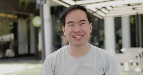Close up portrait of face Charming Asian man with short hair are confident Stock Footage 160141095