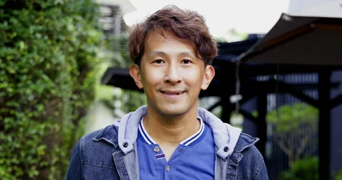 Close up portrait of face Charming Asian man with short hair are confident Video stock 163822652