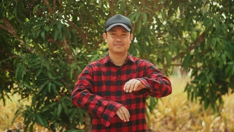 A close up portrait of a farmer looking at camera. Stock Footage 125478551