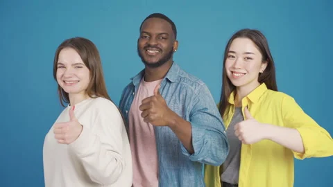 Close-up portrait of group of friends of different races. Smile and approve. Stock Footage 228810812