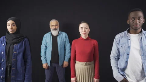 Close-up portrait of a group of friends of different races. Smile, friendship. Video stock 228850012