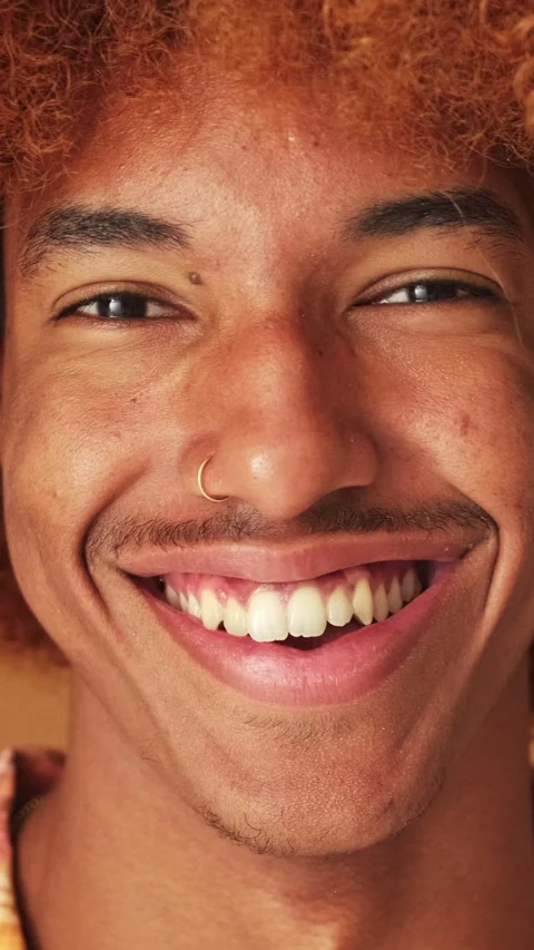 Close up,portrait of a guy smiling widely looking at the camera isolated on Stockbeeldmateriaal 253933627