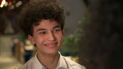 Close-up portrait of handsome young guy zoomer hugging his girlfriend. Happily Stock Footage 168332825