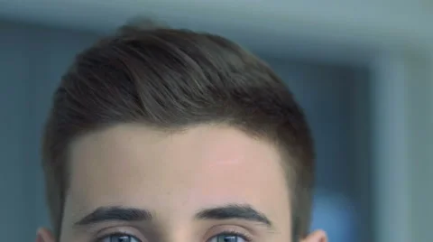 Close up of portrait of handsome young man. Slow motion 스톡 동영상 60113669