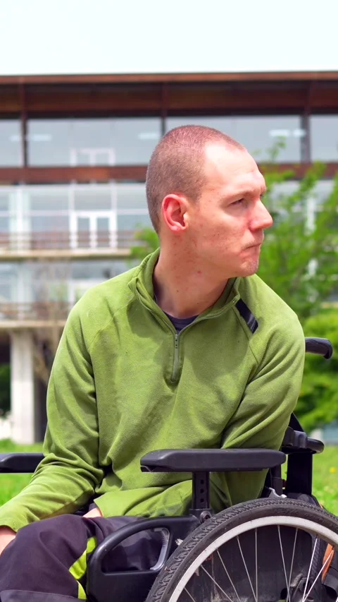 Close-up portrait of a happy disabled man in the university Stock Footage 276457620