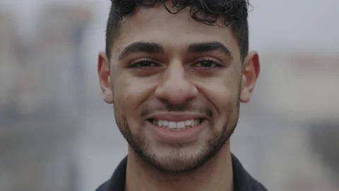 Close up portrait of the happy handsome multi ethnic man standing outside Stock Footage 224346034
