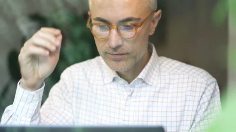 Close-up portrait of happy man working with laptop. Stock-Footage 141746117
