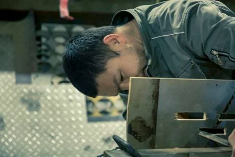 Close-up portrait of locksmith at workplace 스톡 사진
