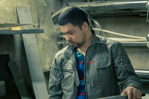 Close-up portrait of locksmith at workplace 스톡 사진