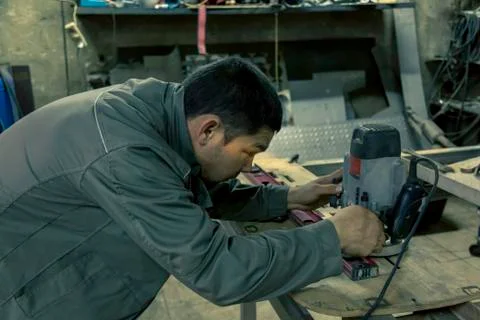 Close-up portrait of locksmith at workplace Fotos Stock