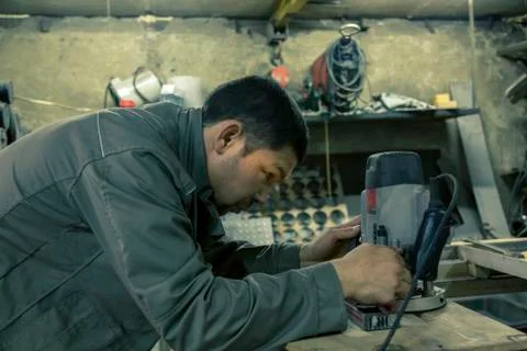 Close-up portrait of locksmith at workplace 스톡 사진