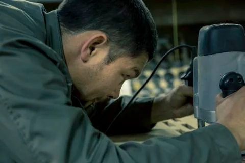 Close-up portrait of locksmith at workplace 스톡 사진