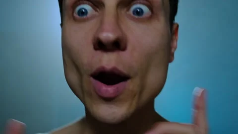 Close up portrait of man dancing with silly expressions for camera. Facial Stock Footage 313053586