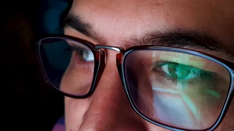 Close up portrait of a man with glasses looking towards door/window/light Stock Footage 148721228