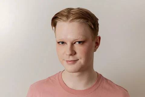 A Close-up Portrait of Man with Makeup and Confident Expression Stock Photos