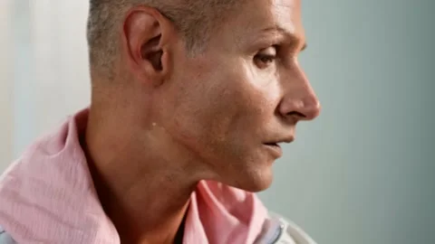 Close Up portrait of Man putting makeup on his face Stock Footage 161833517