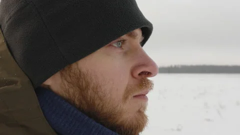 Close up portrait of man in winter. Snow, forest day Stock Footage 231604142