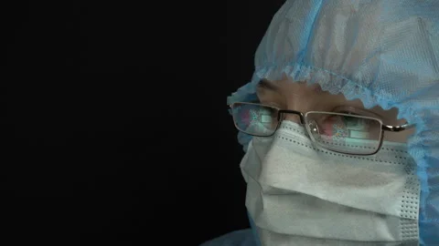 Close-up portrait of a medical worker. The process of working at a computer, gla Stock Footage 129206044
