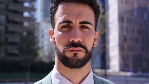 Close up portrait of middle aged Caucasian attractive grizzled business man Stock Footage 268644716