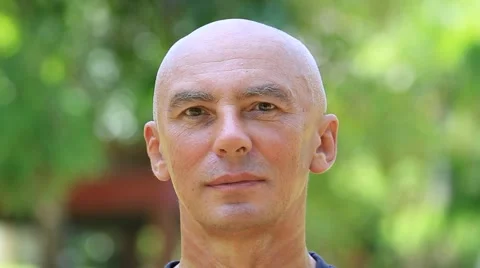 Close up portrait of middle-aged man relaxing in nature Stock Footage 50550281