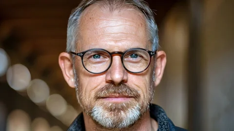 Close-Up Portrait of a Middle-Aged Man with Glasses and Grey Beard Stock Footage 291388570