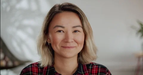 Close up portrait of nice attractive young woman smiling and laughing looking to Stock Footage 120949066